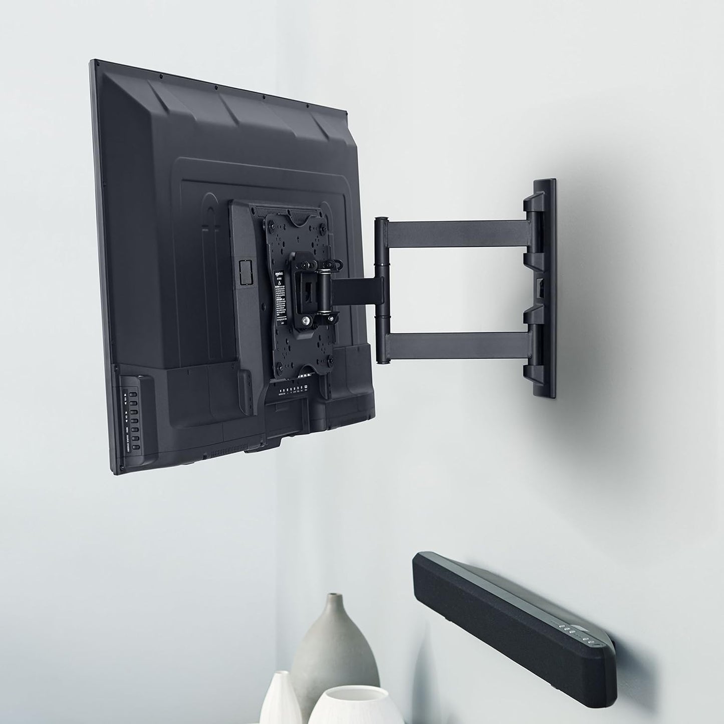 Amazon Basics Full Motion Articulating TV Wall Mount, with Swivel and Tilt, for 26" to 55" TVs and Flat Panels up to 80 Lbs, VESA Compatible, Black