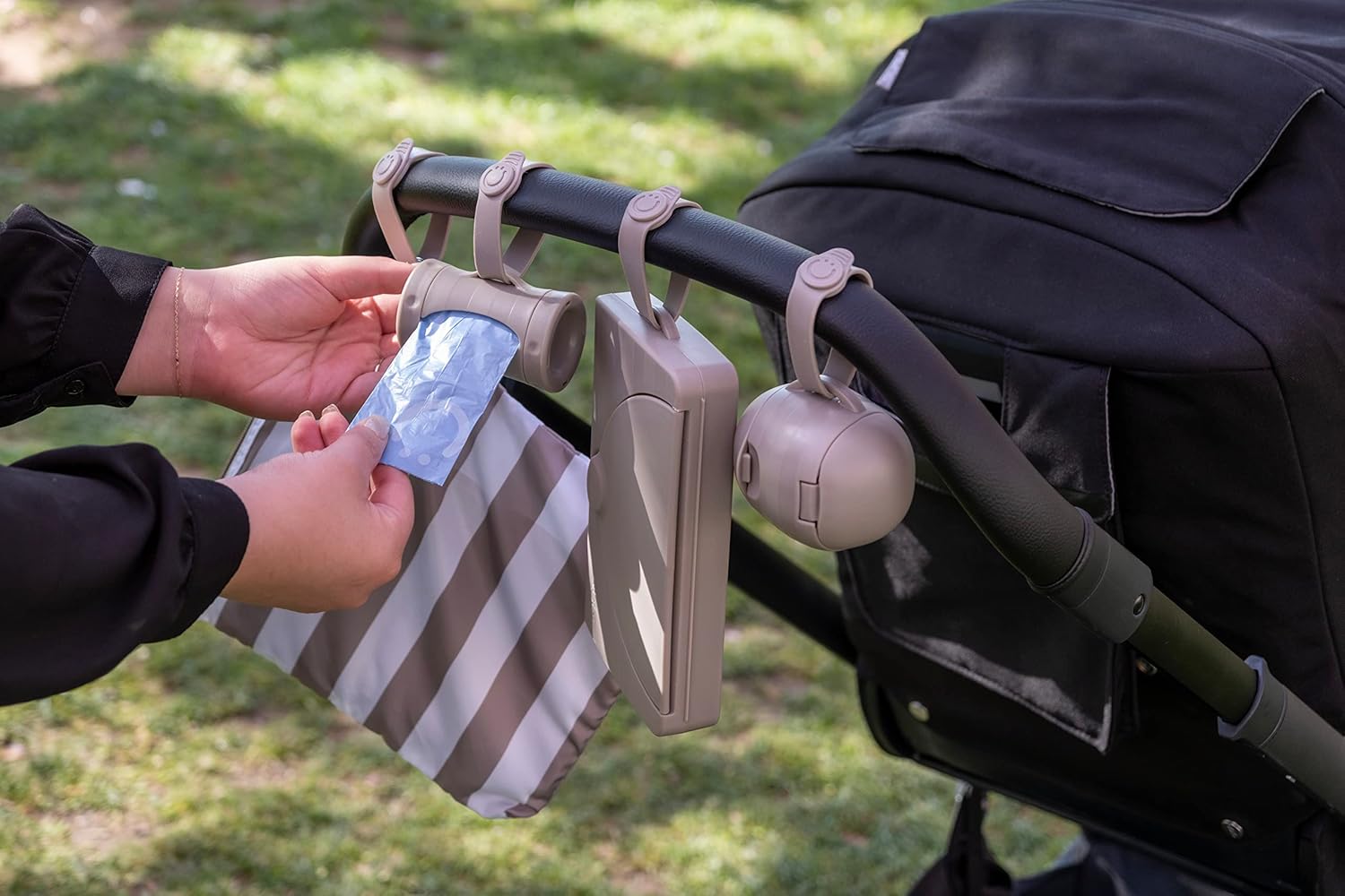 Ubbi Retractable On-the-Go Bag Dispenser for Baby Travel, Diaper Bag A