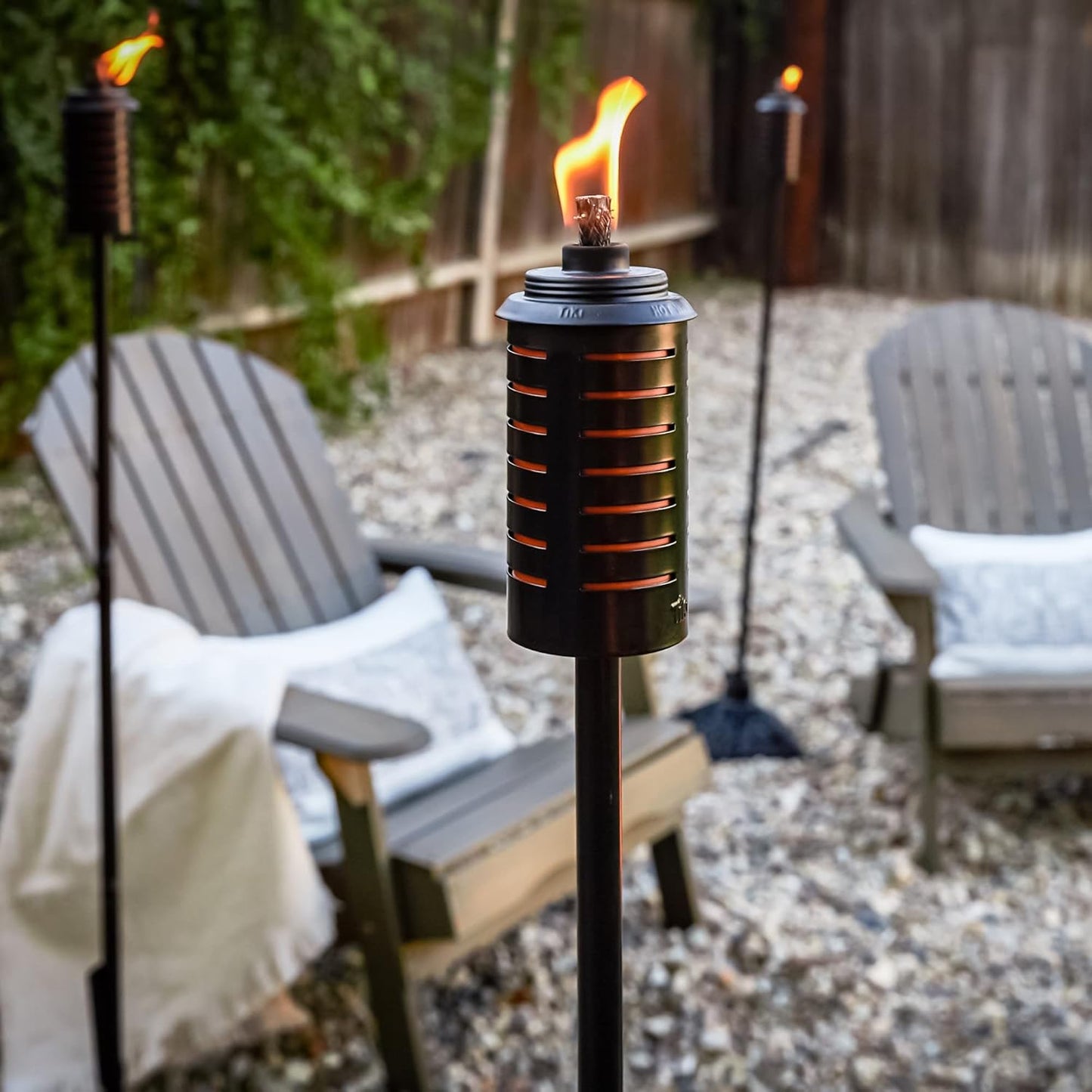 TIKI Metal Black & Orange Easy Install Outdoor Torches, 2-Pack – 65-Inch Decorative TIKI Torches for Patio, Lawn, Backyard & Garden – Weather-Resistant Torch Lighting with Wick & Snuffer