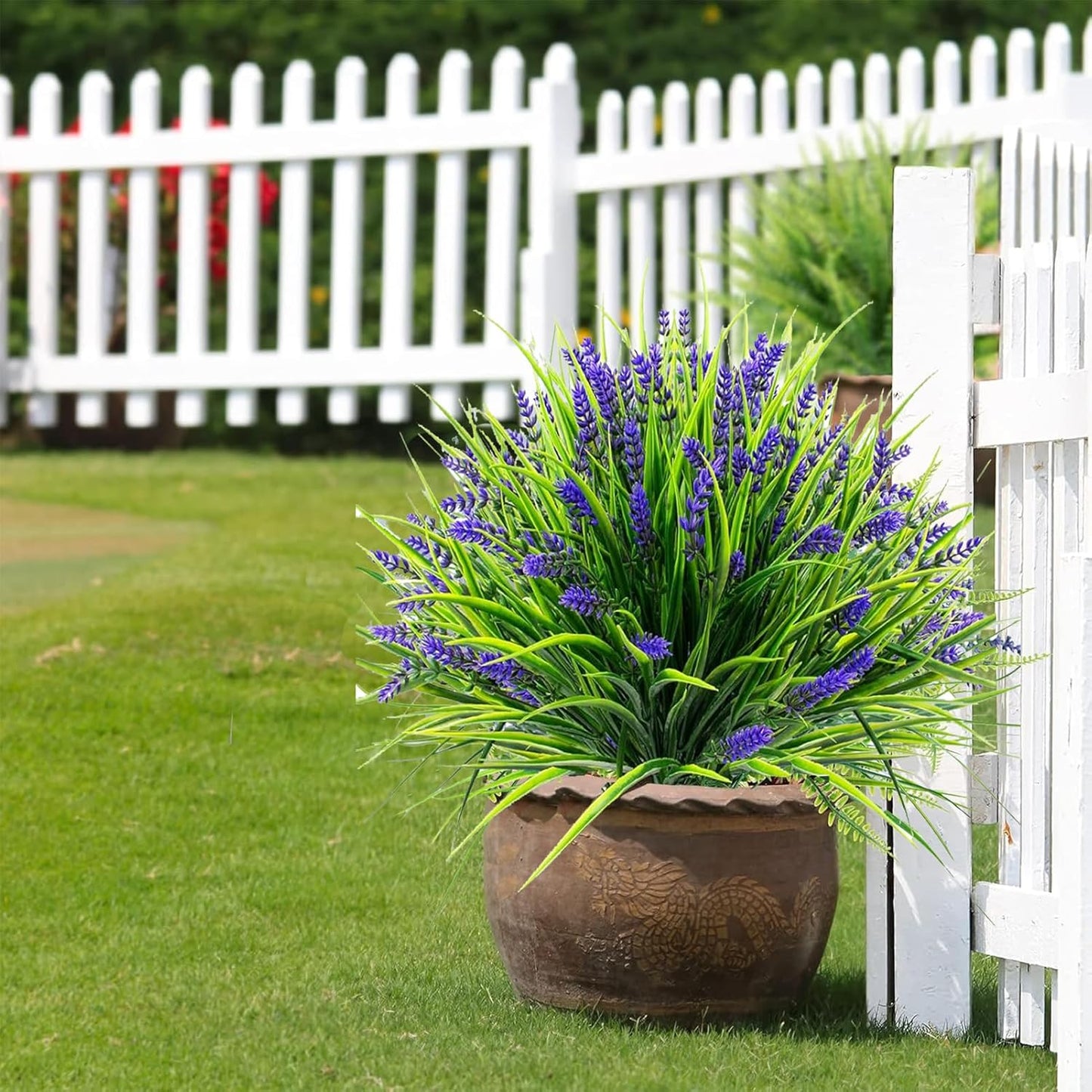 Toprooms 12 Bundles Artificial Plants Outdoor, Fake Monkey Grass with Flowers for Pot UV Resistant Greenery Stems Flowers Shrubs Home Garden Porch Patio Hanging Planter Office Decor (Purple)